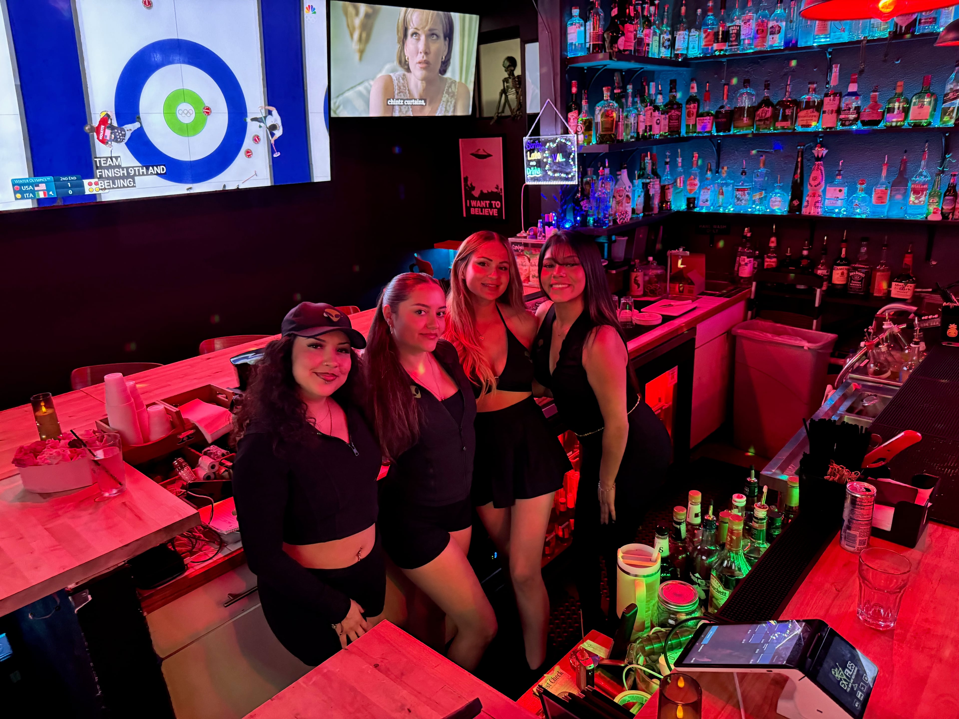 Expert bartenders crafting cocktails at Ex Files